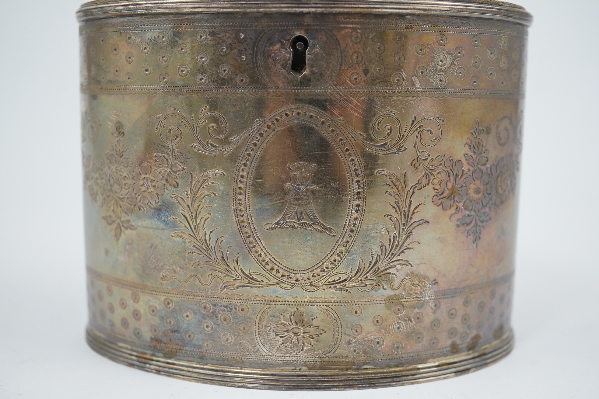 A George III silver oval tea caddy by Hester Bateman